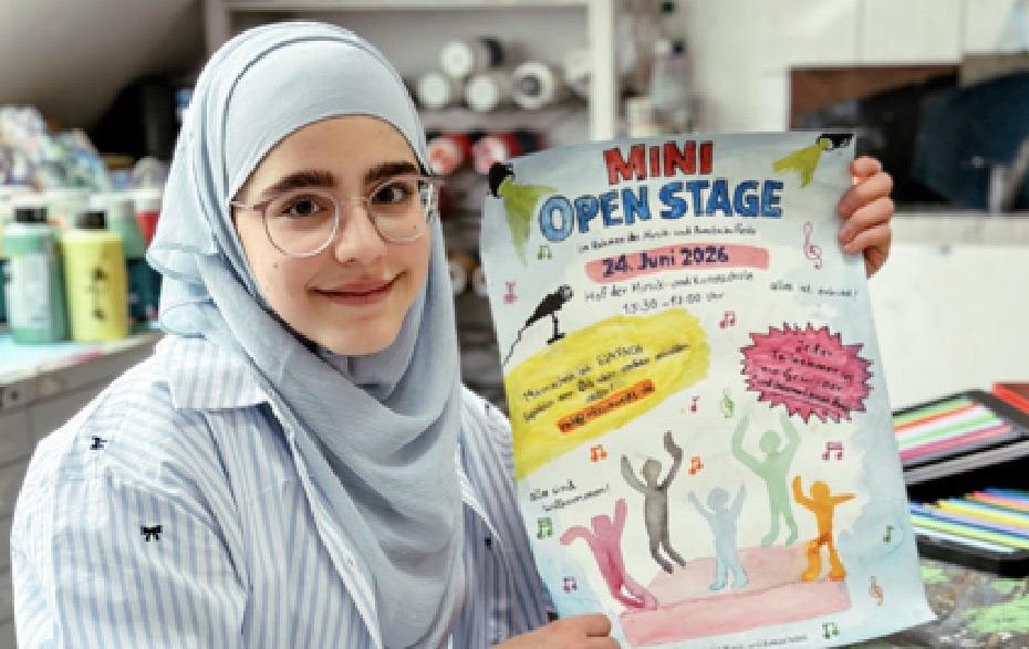 Foto: Mädchen mit Plakat