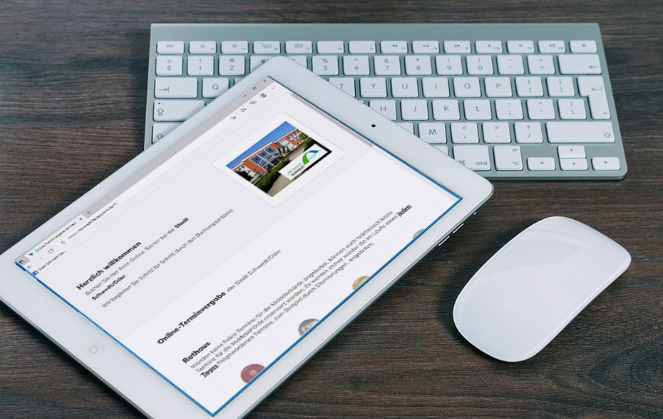 Foto: Tablet mit der Ansicht der Online-Terminvergabe