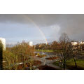 Foto vom 14. Januar 2015: Blick auf die nasse Kreuzung Lindenallee/Bahnhofstraße mit Regenbogen