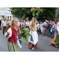 Foto: Frauen mit blühenden Tabakpflanzen