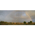 Foto vom 23. Juni 2015: Regenbogen im Abendlicht über der Landschaft