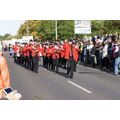 Foto: Spielmannsleute in rot-schwarzem Trikot