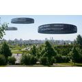 Blick vom Park auf die Stadt mit drei Ufos in der Luft